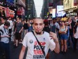 USA: Black Lives Matter Protest in New York City Joshua Lopez doing the Cop Watch. Thousands Marched through the street