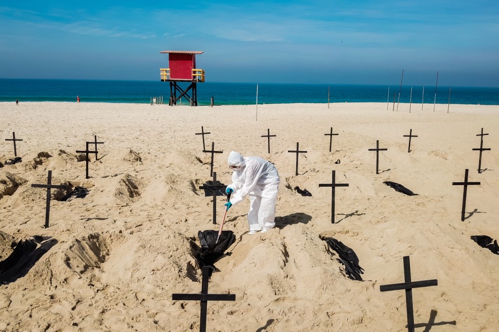 NGO Digs Symbolic Graves in the Sand in Copacabana Beach to Protest Against the Federal Government's Actions During the Coronavirus (COVID-19) Pandemic