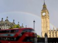 FILE PHOTO: A rainbow is seen behind the Big Ben clock tower, at the Houses of Parliament in central London