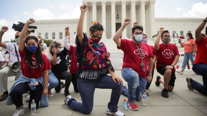 DACA recipients and supporters celebrate outside U.S. Supreme Court after the court ruled that U.S. President Trump's move to rescind the Deferred Action for Childhood Arrivals (DACA) program is illegal in Washington