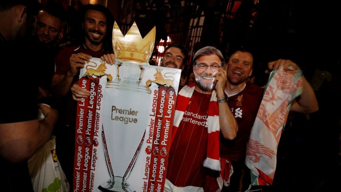 Premier League - Liverpool fans celebrate winning the Premier League