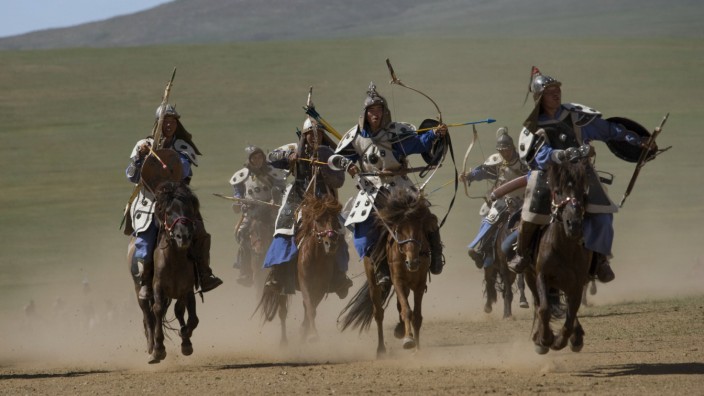 MONGOLIA Re enactement of an attack by the mounted armies of Genghis Khan emperor of the Mongol Emp