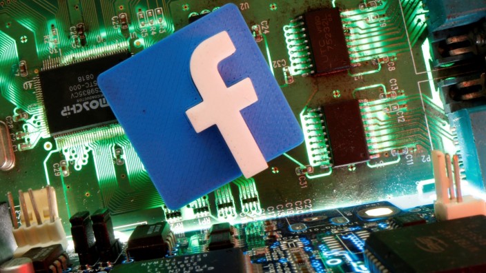 FILE PHOTO: Facebook symbol is seen on a motherboard in this picture illustration