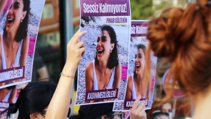 Women killings and annulment of Istanbul Convention protested in Turkey Women wearing a face masks while holds placards
