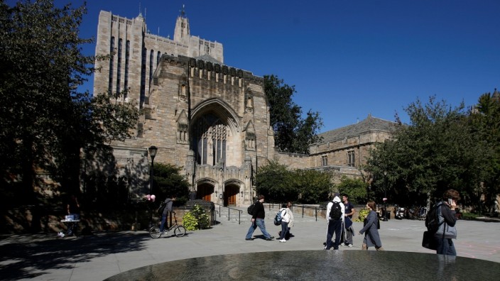 FILE PHOTO: Students walk on the campus of Yale University in New Haven, Connecticut