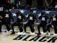 NBA: Spieler der Brooklyn Nets knien vor einem Spiel nieder
