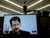 FILE PHOTO: Snowden speaks via video link as he takes part in a round table on the protection of whistleblowers at the Council of Europe in Strasbourg