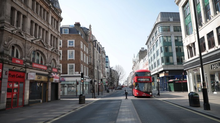 The streets of downtown London are near empty after Prime Minister Boris Johnson imposed a national lockdown from the r