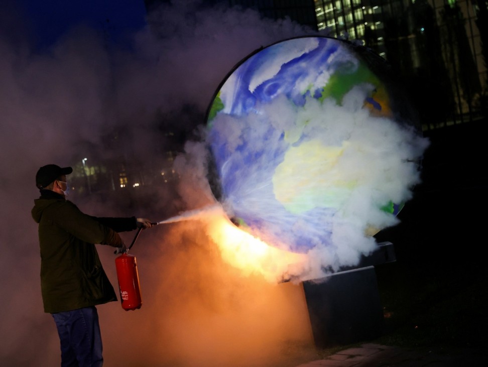 Protest against the fossil fuel industry in front of the headquarters of the European Central Bank (ECB), in Frankfurt