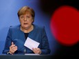 German Chancellor Angela Merkel attends a video-conference
