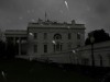 Rain falls over the White House during a storm in Washington