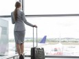 Businesswoman at the airport looking out of window model released Symbolfoto property released PUBLI