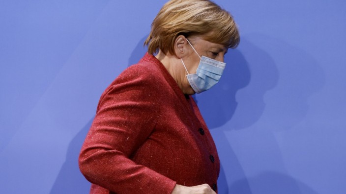 German Chancellor Angela Merkel attends a news conference on COVID-19 in Berlin