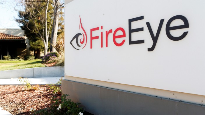 FILE PHOTO: FireEye logo is seen outside the company's offices in Milpitas, California
