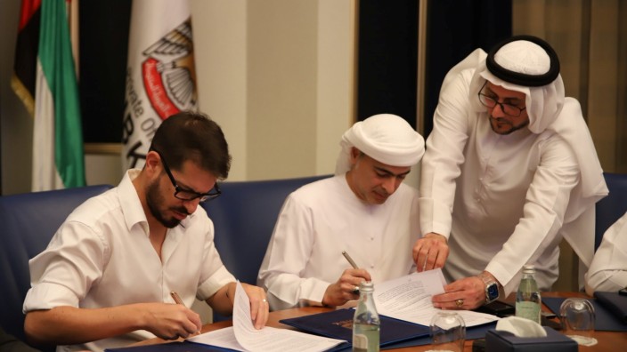 Sheikh Hamad Bin Khalifa Al Nahyan's and Beitar Jerusalem F.C. owner Moshe Hovav pose for a photo in Dubai
