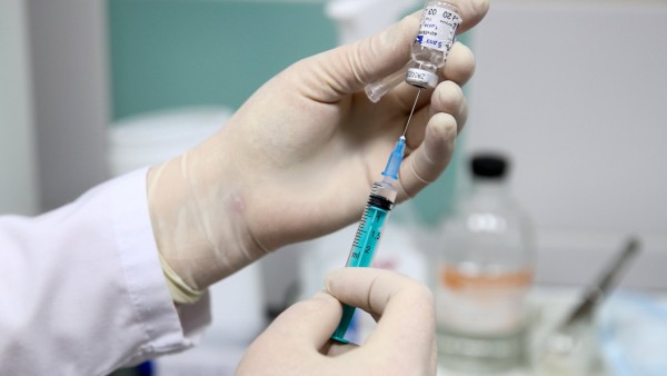 KAZAN, RUSSIA - DECEMBER 15, 2020: A nurse prepares the Gam-COVID-Vak (Sputnik V) vaccine for vaccination of medical wo