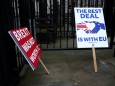 Anti-Brexit signs are pictured at the gates of Downing Street in London
