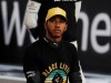 FILE PHOTO: Mercedes' Lewis Hamilton kneels in support of the Black Lives Matter campaign on the grid before the Abu Dhabi Grand Prix