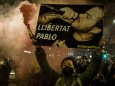 February 16, 2021, Barcelona, Catalonia, Spain: A protestor holds a placard demanding freedom for Pablo during a protes