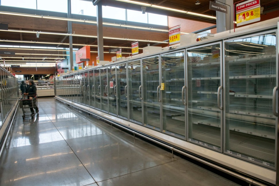 February 18, 2021, Austin, Texas, U.S: Grocery store shelves lay bare at an HEB supermarket in Austin Texas as icy road