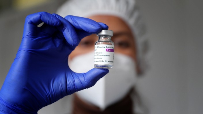 February 13, 2021, Lisbon, Portugal: A health technician prepares a vial of the AstraZeneca Covid-19 vaccine on the fir
