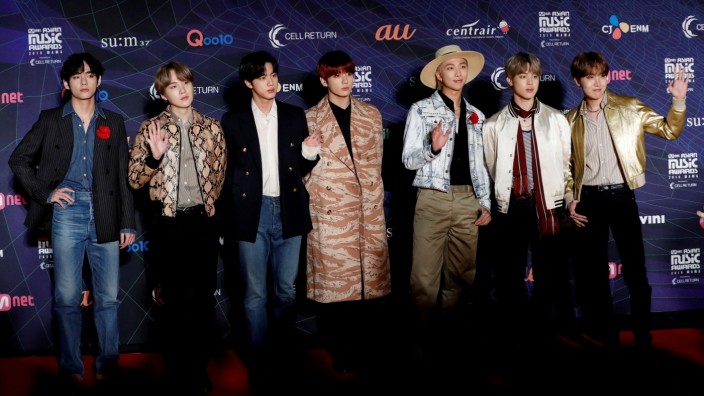 FILE PHOTO: Members of South Korean boy band BTS pose on the red carpet during the annual MAMA Awards at Nagoya Dome in Nagoya