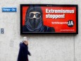 A poster of the initiative committee against wearing the Burka is seen in Zurich