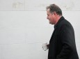 Piers Morgan walks near his house in London