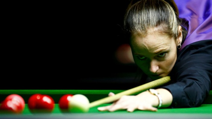 FILE PHOTO: Reanne Evans of England plays a shot during her semi-final match against Ng On-Yee of Hong Kong during the Eden World Women's Snooker Championship in Singapore