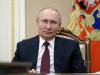 Russian President Vladimir Putin takes part in a video conference in Moscow