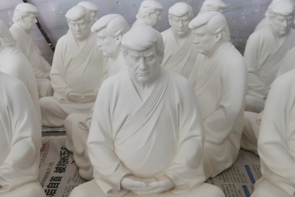 Statues depicting former U.S. President Donald Trump at a workshop in Dehua