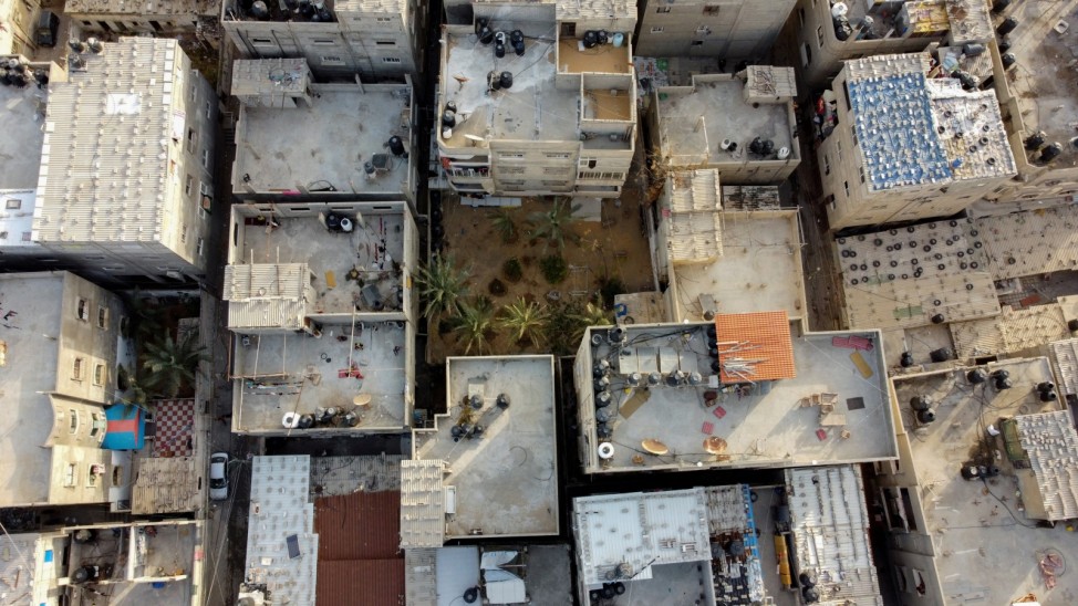 A picture taken with a drone shows Palestinian houses and buildings at Beach refugee camp in Gaza City