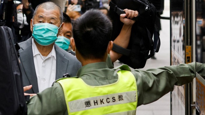 FILE PHOTO: Media mogul Jimmy Lai, founder of Apple Daily, leaves the Court of Final Appeal by prison van in Hong Kong