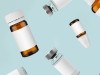 Falling,Injection,Vial,Glass,Bottles,With,White,Labels