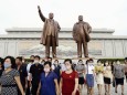 Scenes from Pyongyang North Korean citizens visit Mansu Hill in Pyongyang on July 8, 2020, wearing face masks amid conce