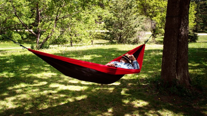 May 30, 2021, Ottawa, on, Canada: Sam Akkawi relaxes in his hammock in the Dominion Arboretum in Ottawa, on Sunday, May