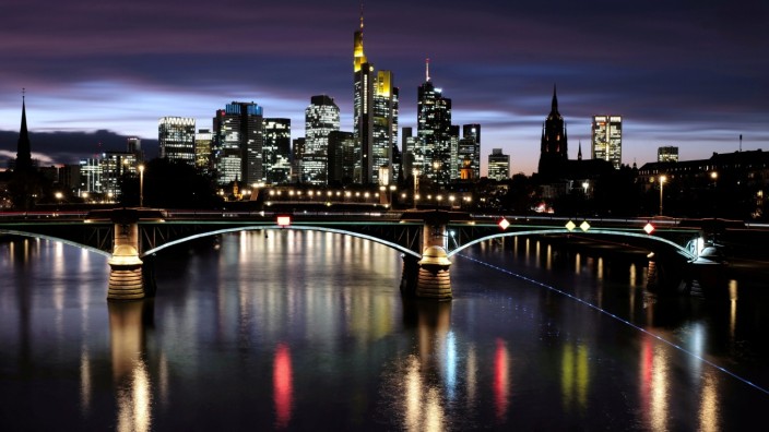 FILE PHOTO: The skyline with its financial district is photographed during sunset as the spread of the coronavirus disease (COVID-19) continues in Frankfurt