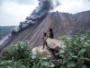 August 22, 2019 Jharia, Jharkhand, India: Two children are witnessing dumping in a dumping ground near a coal mine. Earl