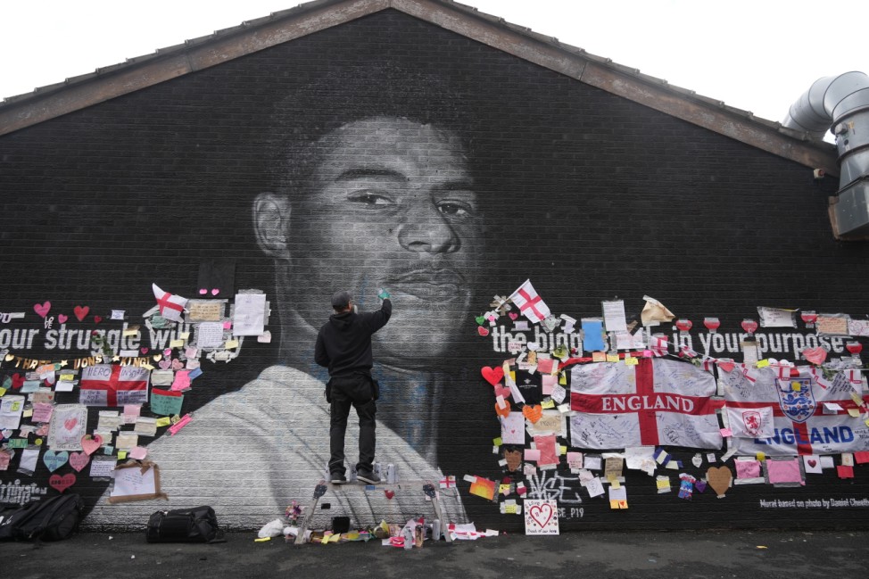 Defaced Mural Of Marcus Rashford Repaired By The Artist In Manchester