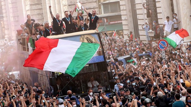 The Italy team drive through Rome on a open top bus tour after they won Euro 2020