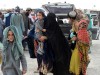Afghanistan: Eine pakistanische Familie auf dem Weg nach Pakistan.