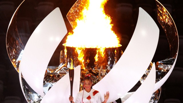 TOKYO, JAPAN JULY 23, 2021: Tennis player Naomi Osaka lights the Olympic Cauldron at the opening ceremony of the Tokyo