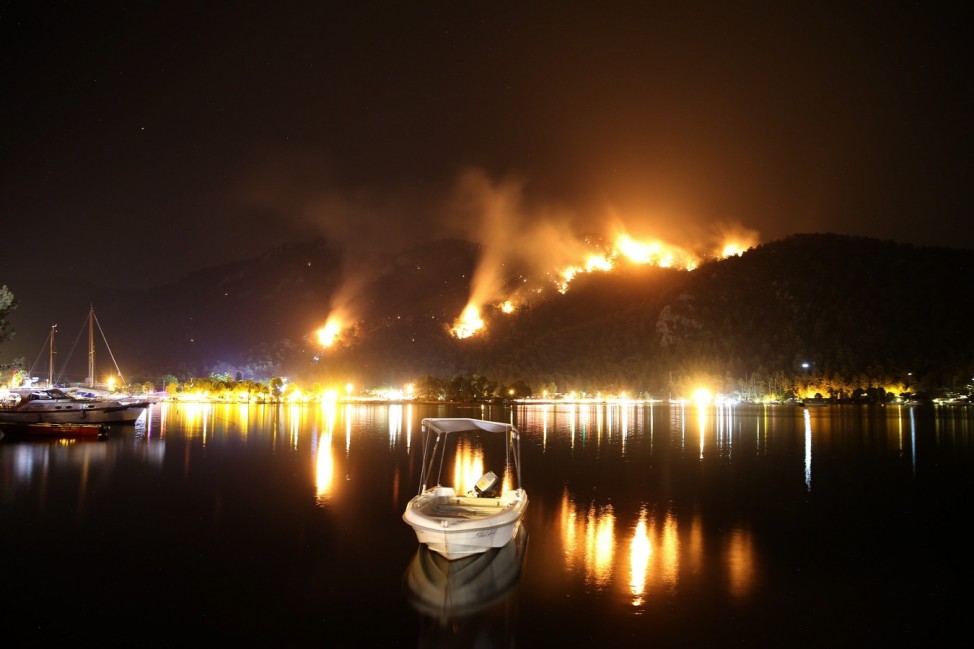 Fire fighters work to stop forest fires near Orhaniye village at Marmaris, mediterranean coastal city in Antalya. More t
