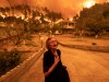 Residents Evacuate Greek Island Hit By Wildfires