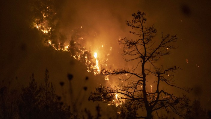 Greece s Evia Island Continues To Burn Night view of wildfire in the Avgaria village, in Evia (Euboea) island, Greece,
