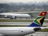 FILE PHOTO: A South African Airways (SAA) plane is towed at O.R. Tambo International Airport in Johannesburg