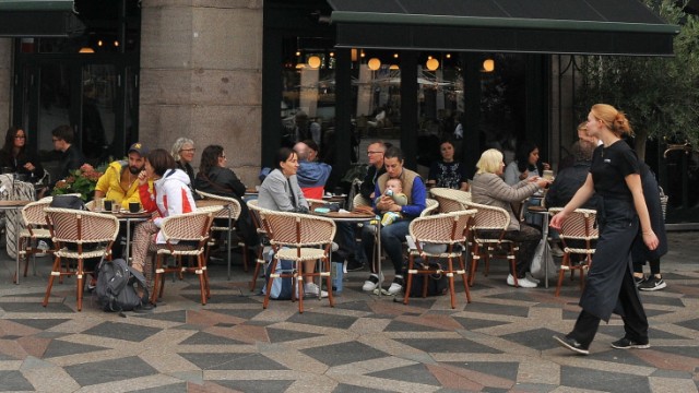 Copenhagen, Denmark., 29 August 2021, /Cafe customers enjoy outdoor food service during summer season in danish capital.