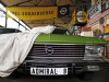 A vintage Opel  'Admiral' car is covered at the Opel museum in Herne