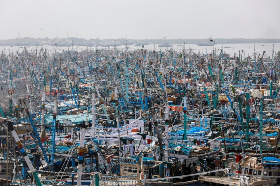 General view of anchored fishing boats at Karachi Fish Harbour in Karachi