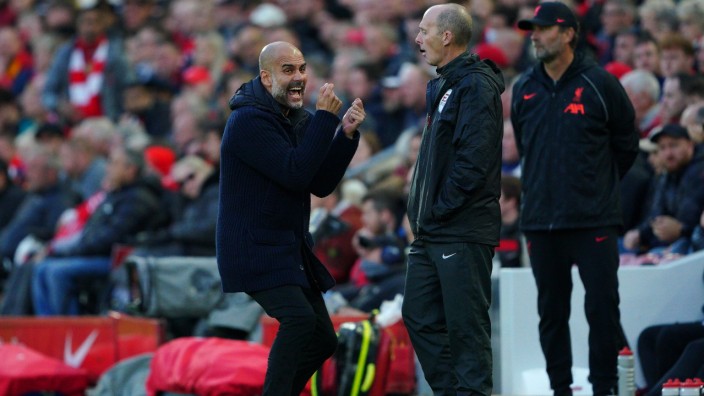 Liverpool v Manchester City - Premier League - Anfield Manchester City manager Pep Guardiola reacts on the touchline du